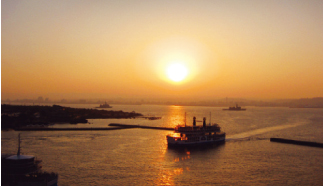 Sunset behind Sakurajima Ferry